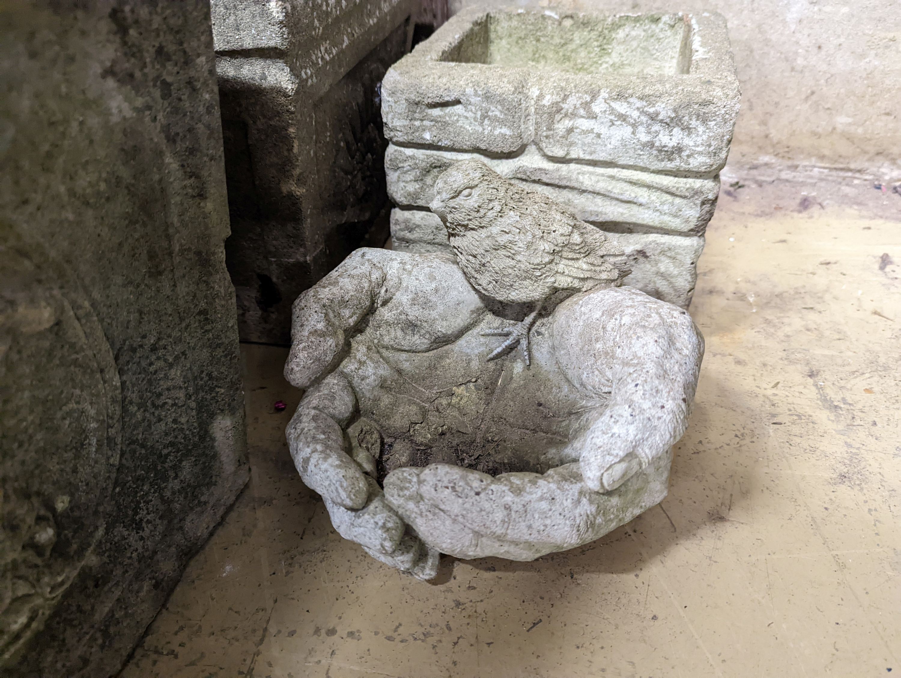Three square reconstituted stone garden planters together with a bird bath, largest height 32cm